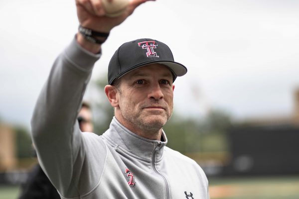 Texas Tech Football Head Coach Matt Wells throws the ceremonial first pitch before the game against New Mexico at 6:30 p.m. on Tuesday. April, 23, 2019 at Dan Law Field at Rip Griffin Park. The Red Raiders defeat the Lobos, 6-3.