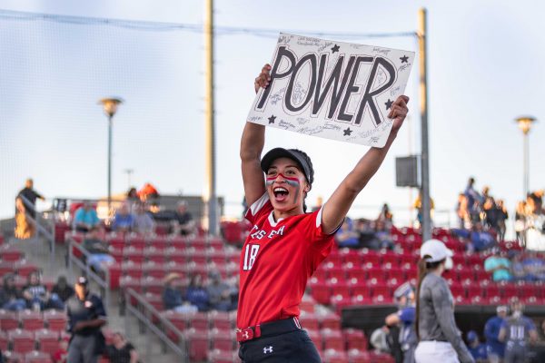 Sophomore INF Olga Zamarripa gets the crowd hyped up with the "Raider Power" chant during game two against Kansas at 6 p.m. on Friday, April 19, 2019 at Rocky Johnson Field. The Red Raiders tie the seres against the Jayhawks, 10-2 in five innings.