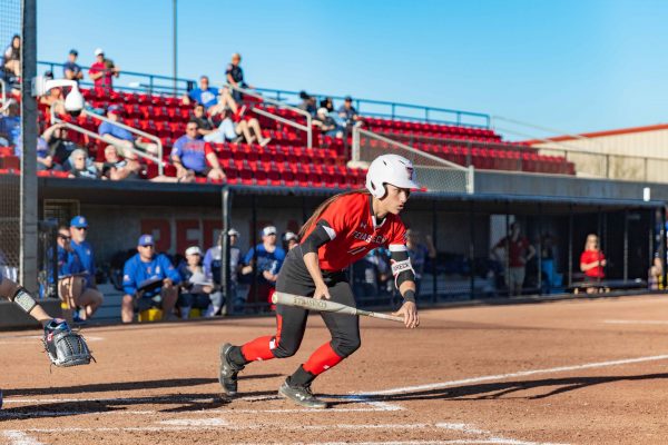 Senior UTL Taylor Satchell bunts during game two against Kansas at 6 p.m. on Friday, April 19, 2019 at Rocky Johnson Field. The Red Raiders tie the seres against the Jayhawks, 10-2 in five innings.